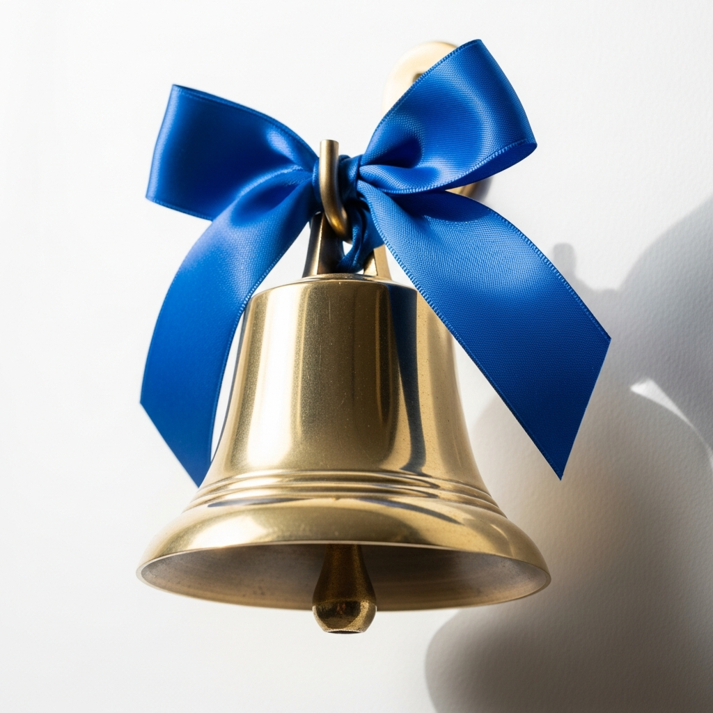 Brass bell with a blue ribbon